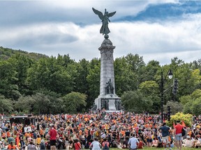 Thousands gathered at the George-Étienne Cartier monument at Jeanne-Mance Park on Thursday to honour Indigenous children.
