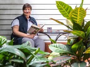 Nathalie Zinger, who is retiring from the Nature Conservancy of Canada after years spent directing species and habitat conservation efforts in Quebec for various organizations, in her backyard in Montreal on Saturday, July 3, 2021.