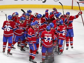 The Canadiens celebrate their Game 4 overtime victory over the Tampa Bay Lightning in Montreal on July 5, 2021.