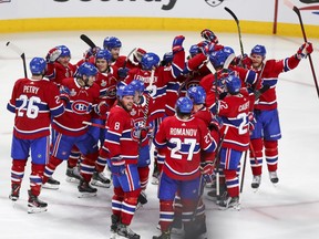 The Montreal Canadiens celebrate their overtime victory over the Tampa Bay Lightning in Game 4 of the Stanley Cup Finals at the Bell Centre, Monday July 5, 2021.