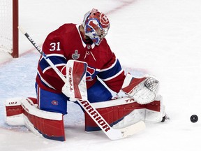 Montreal Canadiens goaltender Carey Price makes a save against the Tampa Bay Lightning  during Game 4 of the Stanley Cup final in Montreal on July 5, 2021.