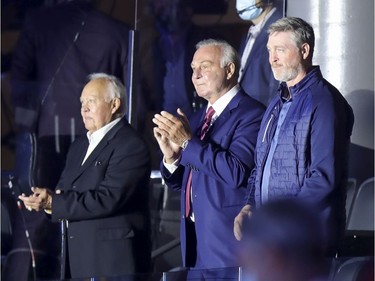 Montreal Canadiens legends Yvan Cournoyer, left, Guy Lafleur and Patrick Roy are introduced prior to Game 4 of the Stanley Cup final against the Tampa Bay Lightning in Montreal on Monday, July 5, 2021.