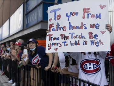 Montreal Canadiens fans cheer as the team arrives at the Bell Centre for Game 4 of the Stanley Cup final against the Tampa Bay Lightning in Montreal on Monday, July 5, 2021.