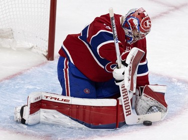 Montreal Canadiens goaltender Carey Price (31) makes one of 12 first-period saves against the Tampa Bay Lightning during Game 4 of the Stanley Cup final in Montreal on Monday, July 5, 2021.