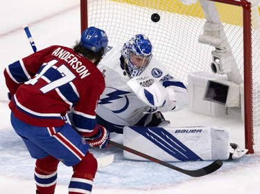 Montreal Canadiens right wing Josh Anderson (17) beats Tampa Bay Lightning goaltender Andrei Vasilevskiy (88) to open the scoring during Game 4 of the Stanley Cup final in Montreal on Monday, July 5, 2021.