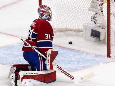 Montreal Canadiens goaltender Carey Price (31) looks away from his net after the Tampa Bay Lightning scored to tie the game 1-1 during Game 4 of the Stanley Cup final in Montreal on Monday, July 5, 2021.