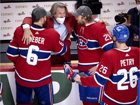 Canadiens general manager Marc Bergevin congratulates Shea Weber, Eric Staal and Jeff Petry after Montreal defeated the Golden Knights to advance to the Stanley Cup final.