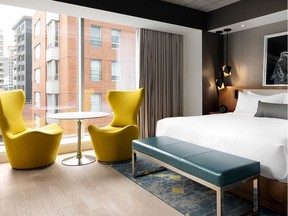 Guest rooms at the Humaniti Hotel Montreal have contemporary decor with textural contrasts.