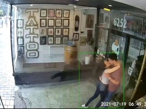 Surveillance camera footage at Savvy Barbershop shows the couple embracing and leaning against the shop window, which gives way and sends them crashing to the floor amid shards of glass.