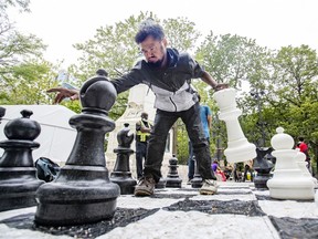 Jeffrey Wayne Kasuduak plays chess in Cabot Square in Montreal.