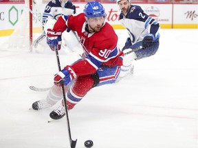 Canadiens' Tomas Tatar controls the puck in front of Jets defenceman Dylan DeMelo during a game in April. Tatar could be just what the Habs' offence needs right now in the Stanley Cup final, Andrew Berkshire writes.