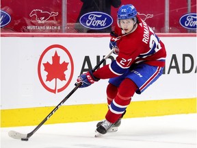 Montreal Canadiens defenceman Alexander Romanov looks to make a pass during second period against the Winnipeg Jets in Montreal on April 8, 2021.
