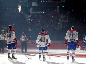 The Canadiens’ Paul Byron lines up for the national anthems between teammates Joel Edmundson and Jeff Petry before start of Game 2 of Stanley Cup final against the Lightning in Tampa.