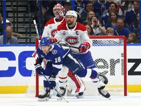 Tampa Bay Lightning's Ondrej Palat battles with Montreal Canadiens' Shea Weber in front of Carey Price during the first period in Game 5 of the Stanley Cup Final, Wednesday July 7, 2021 at Amalie Arena in Tampa.