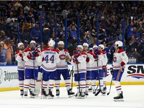 Canadiens players wait to shake hands with the Lightning after losing Game 5 of Stanley Cup final 1-0 Wednesday night at Amalie Arena in Tampa.