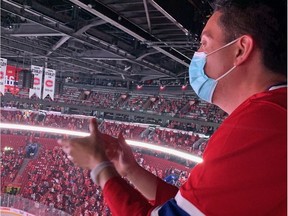 Robert Hing, a Canadiens fan from Calgary, cheers the team on during Game 3 of Stanley Cup Final against the Tampa Bay Lightning at the Bell Centre.