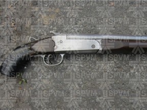 A photo released by Montreal police shows a sawed-off 12-gauge shotgun seized at the home of Nathaniel Pierre, 36.