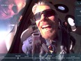 Billionaire Richard Branson reacts on board Virgin Galactic's passenger rocket plane VSS Unity after reaching the edge of space above Spaceport America near Truth or Consequences, N.M., July 11, 2021 in a still image from video.