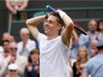 Canada's Denis Shapovalov celebrates his win over Russia's Karen Khachanov during their men's quarter-finals match on the ninth day of the 2021 Wimbledon Championships at The All England Tennis Club in Wimbledon, southwest London, on July 7, 2021.