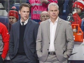 Éric Raymond (left) was the goalie coach and Dominique Ducharme (right) was the head coach when Team Canada won the gold medal at the 2018 IIHF World Junior Hockey Championship.