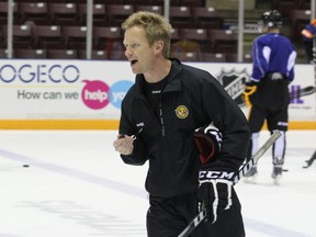 Sarnia Sting coach Trevor Letowski is pictured putting players through their paces during practice on Sept. 12, 2013.