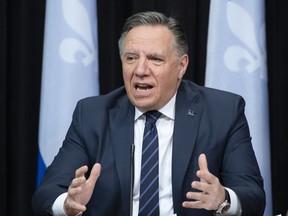 Premier François Legault speaks during a news conference after tabling new language legislation Thursday, May 13, 2021 at the legislature in Quebec City.