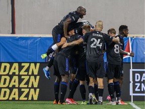 CF Montreal midfielder Mathieu Choinière (29) celebrates his goal with teammates during the first half against Inter Miami CF at Red Bull Arena.