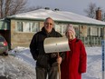 Bill Migicovsky and his wife Esty Feldman were among the customers who were left in the lurch by the snow removal company Bo Pelouse after they declared bankruptcy. The couple is pictured here outside their Dorval home in January, 2020.