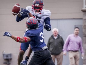 Linebacker Patrick Levels, 3, breaks up a pass intended for wide-receiver B.J. Cunningham during Alouettes practice in 2019.