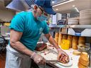 “What makes this place tick is there are no owners standing around in ties here and telling us what to do. They’re workers,” says Snowdon Deli smoked-meat cutter Bobby Hliaras.