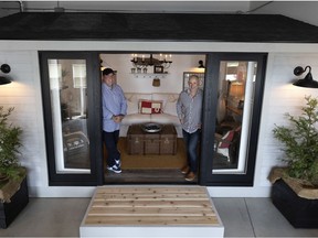 Partners Gord Critch, left, and Aidan Griffin of Outhaus Cabanas with a sample unit.