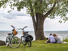 Jason Moscovitch and his wife, Keely McGlynn, enjoy a quiet moment on the Pointe-Claire shoreline on August 12, 2021, the day before McGlynn celebrates her 40th birthday.