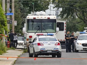 Laval police set up a command post Aug. 17, 2021 near the scene of a fatal shooting in the Pont-Viau district of Laval.