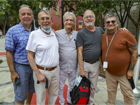 Montreal gay rights pioneers, from left, Richard Burnett, Michael Hendricks, Roger Leclerc, René Leboeuf and Puelo Deir gather for a photo at the inauguration of the new Parc de L'Espoir in the Gay Village on Tuesday.