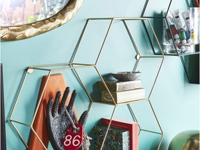 Wall-mounted hanging hooks and shelves keep tabletops, desks and the floor free of clutter. Geometric Hanging Storage Shelf, $35, Marshalls