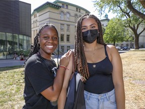 Dawson College students Melissa Saget, left, and Ines Sakta in between classes on the first day of the CEGEP school year, in Montreal Monday August 23, 2021.