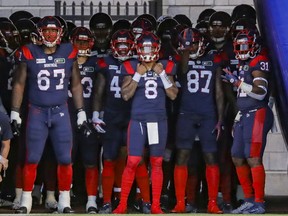 #8 Vernon Adams Jr. and the rest of the Montreal Alouettes players wait to take the field for their Canadian Football League home game against the Hamilton Tiger-Cats in Montreal Friday August 27, 2021.  It was the Alouettes first home game since the beginning of the COVID-19 pandemic.