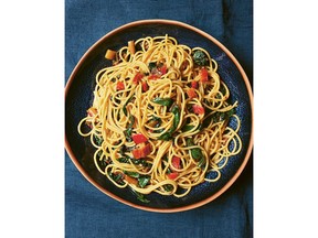Spaghetti with chard and anchovies from Cook, Eat, Repeat by Nigella Lawson.