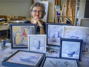 Artist Louise Langlois with some of the frescos she has created at her home in Baie-D'Urfé.