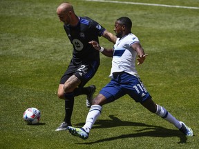 CF Montréal's Aljaz Struna, left, and Cristian Dajome of the Vancouver Whitecaps vie for the ball during a game at Rio Tinto Stadium in Sandy, Utah, on on May 8, 2021.