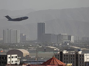 A U.S. Air Force aircraft takes off from the military airport in Kabul on Aug. 27.