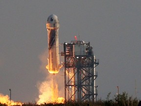 VAN HORN, TEXAS - JULY 20:  Blue Origin's New Shepard lifts-off from the launch pad carrying Jeff Bezos along with his brother Mark Bezos, 18-year-old Oliver Daemen, and 82-year-old Wally Funk on July 20, 2021 in Van Horn, Texas. Mr. Bezos and the crew are riding in the first human spaceflight for the company.