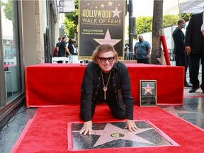 Don McLean is seen with his star on the Hollywood Walk of Fame on Aug. 16, 2021.