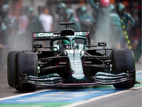 Lance Stroll of Canada driving the (18) Aston Martin AMR21 Mercedes in the Pitlane during qualifying ahead of the F1 Grand Prix of Belgium at Circuit de Spa-Francorchamps on Saturday, Aug. 28, 2021, in Spa, Belgium.