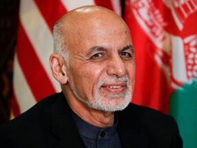 Afghanistan President Ashraf Ghani looks on during a bilateral meeting with U.S. President Donald Trump, during a surprise visit at Bagram Air Base in Afghanistan, Nov. 28, 2019.