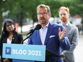 Bloc Québécois Leader Yves-François Blanchet  speaks to the media during his election campaign tour in Montreal on Aug. 30, 2021.