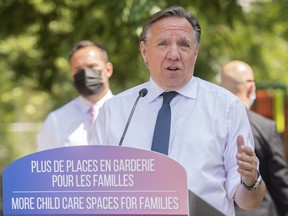 "If we don't want to add to the deaths, if we don't want to overwhelm hospitals, I am asking all Quebecers — it's a question of solidarity — to go get your two doses," Premier François Legault said Thursday.
