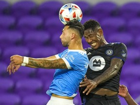 CF Montréal striker Romell Quioto, right, and New York City midfielder Valentin Castellanos vie for a header during the first half at Exploria Stadium in Orlando on July 7, 2021.