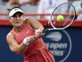 Bianca Andreescu of Mississauga, Ont., hits a shot against British qualifier Harriet Dart  during second-round play Tuesday night at the Jarry Tennis Centre.