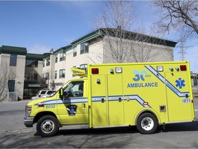 Paramedics drive away from CHSLD Herron after picking up a resident at the nursing home in Dorval, west of Montreal Wednesday April 8, 2020.